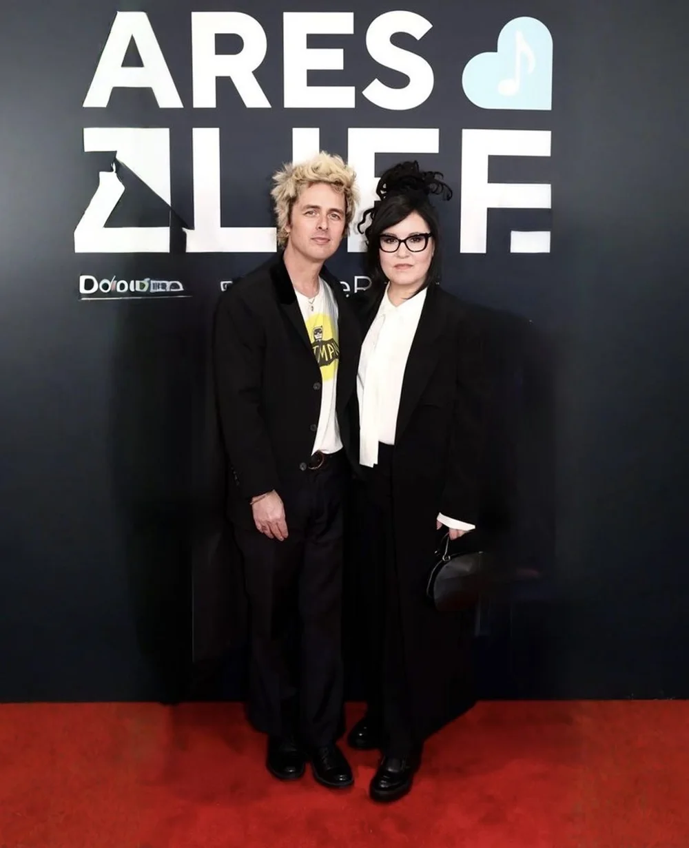 Billie Joe and Adrienne Armstrong styled for the 2025 Grammys