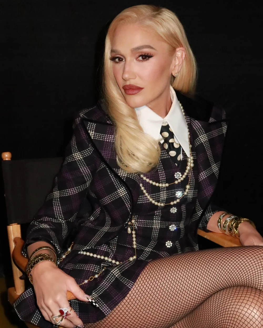 Gwen Stefani in a plaid two-piece look backstage