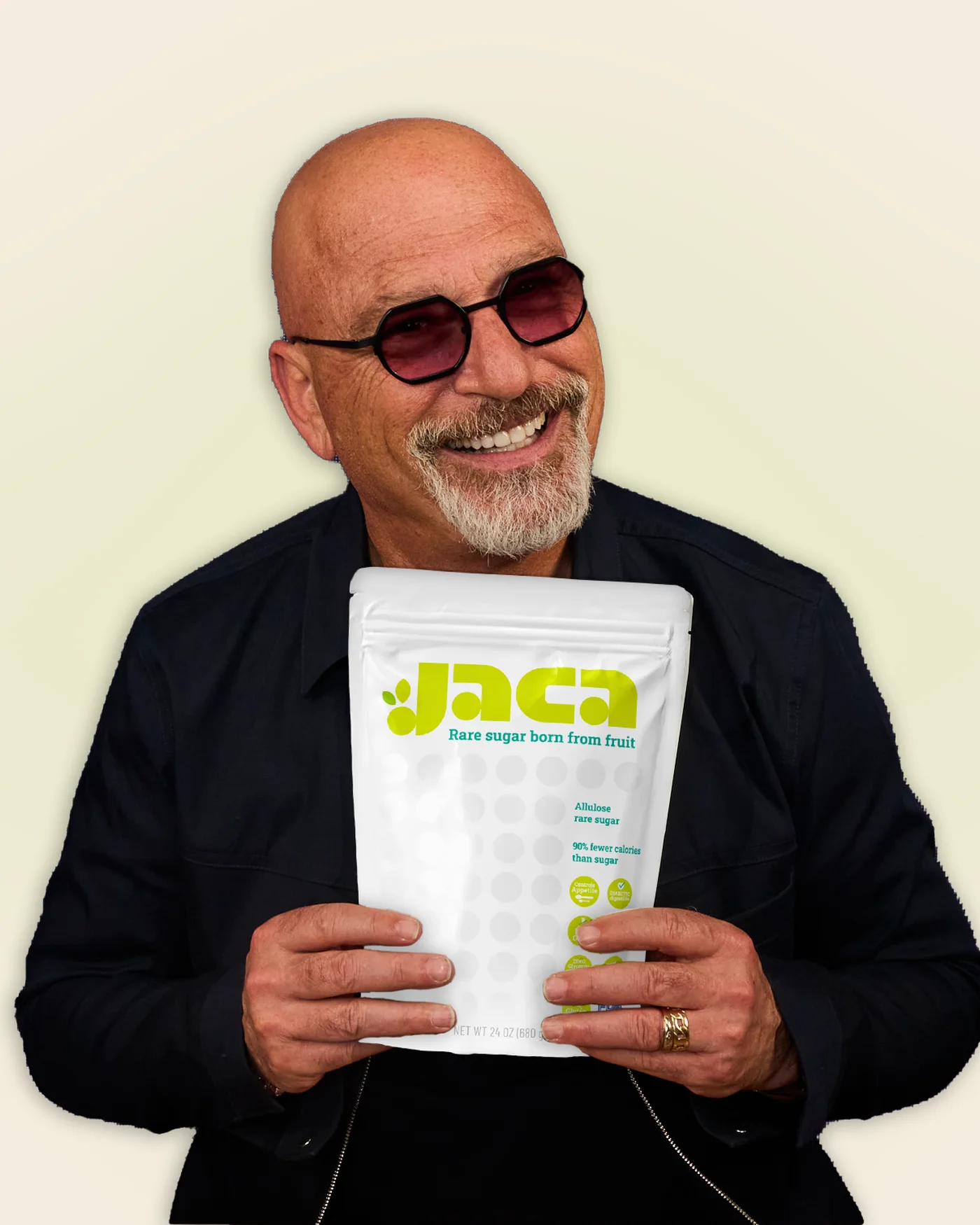 Howie Mandel holding the JACA pouch